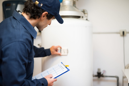 Technician checking a water tank