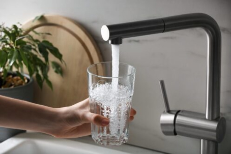 Getting a glass of water from a faucet